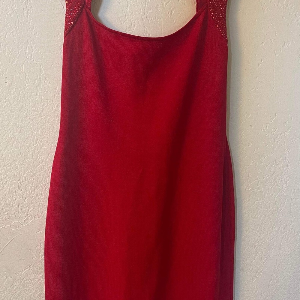 Like new. St. John size 6 red party dress.